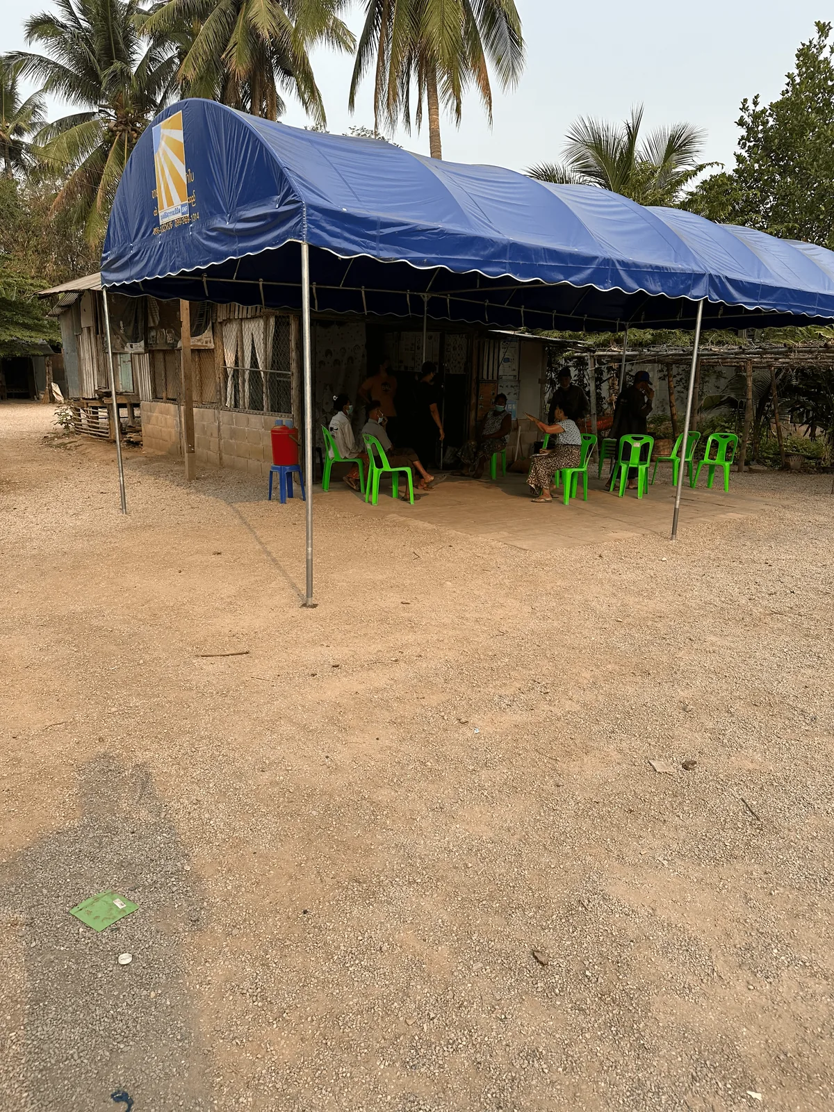 Community members waiting to be seen at the mobile clinic